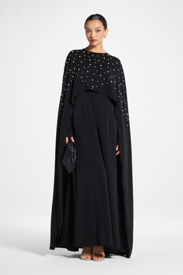 black dress with cape Long this dress combines style with versatility for the modern woman Pearl Cape Maxi Dress -