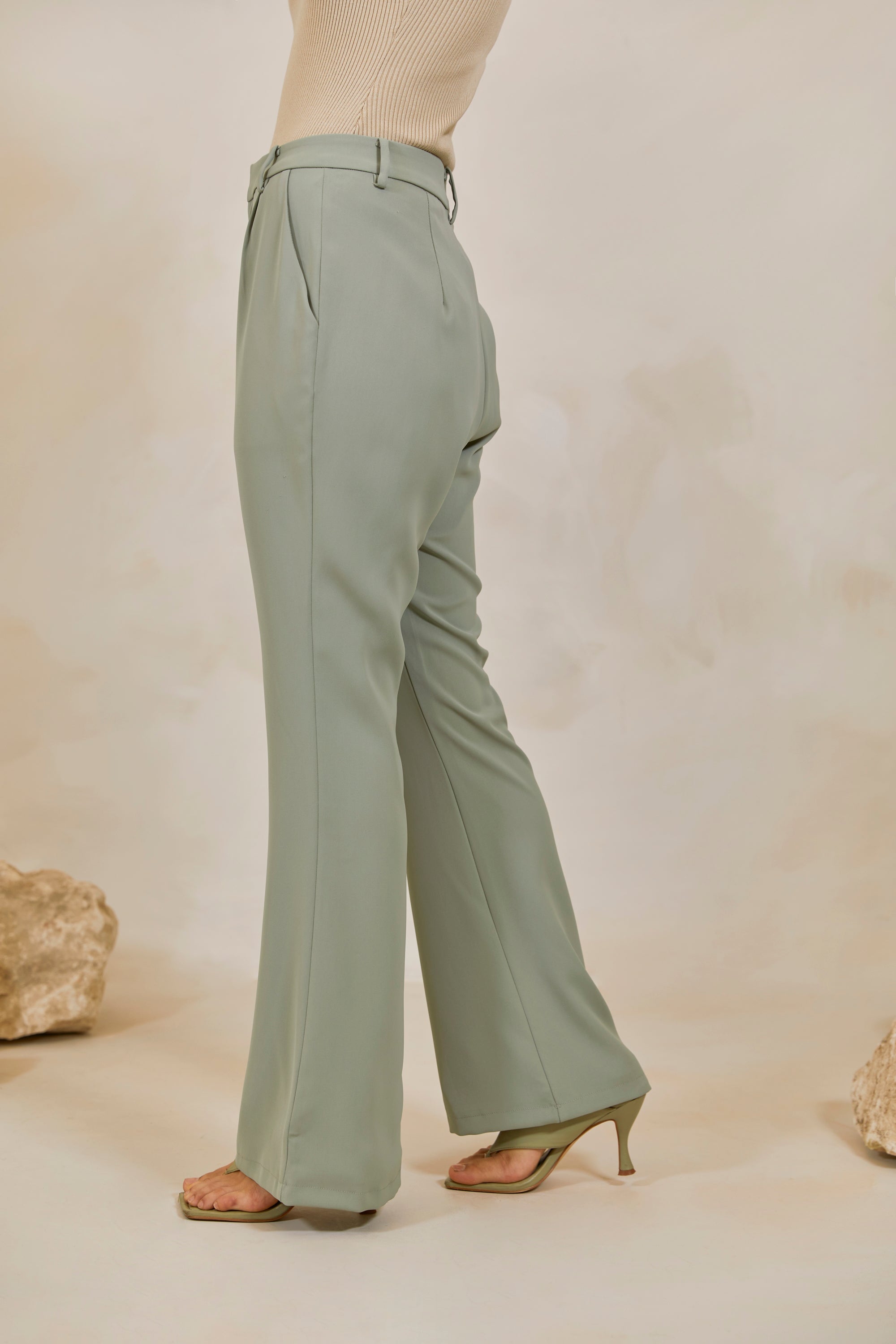 https://veiled.com/cdn/shop/products/timani-slim-leg-trousers-sage-649409.jpg?v=1668711993&width=2000